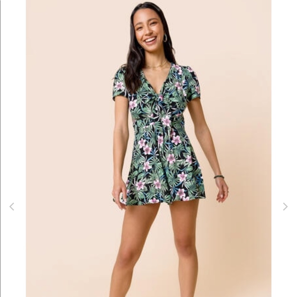 NWT. Francesca’s floral romper